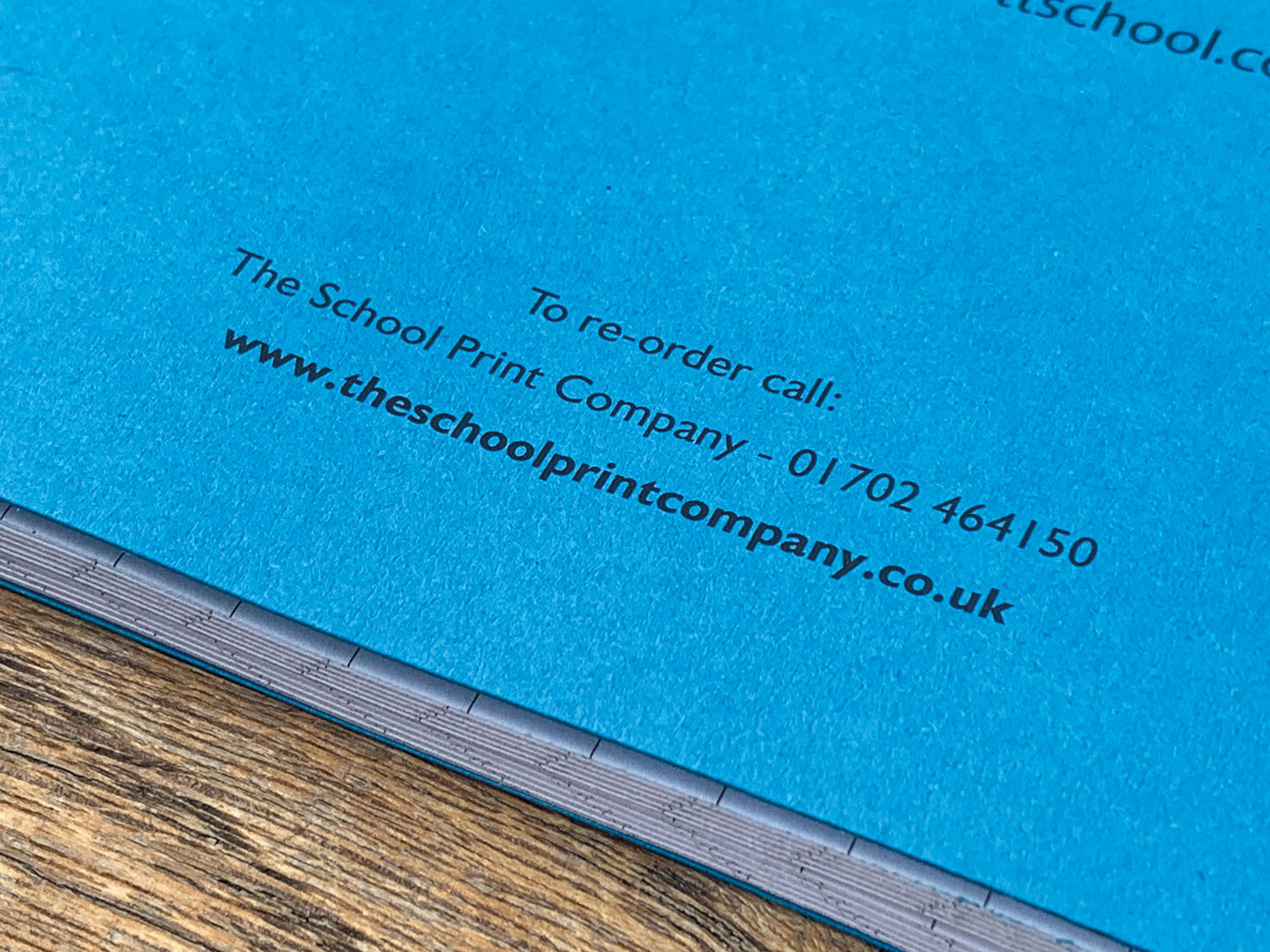 hole punched school exercise books