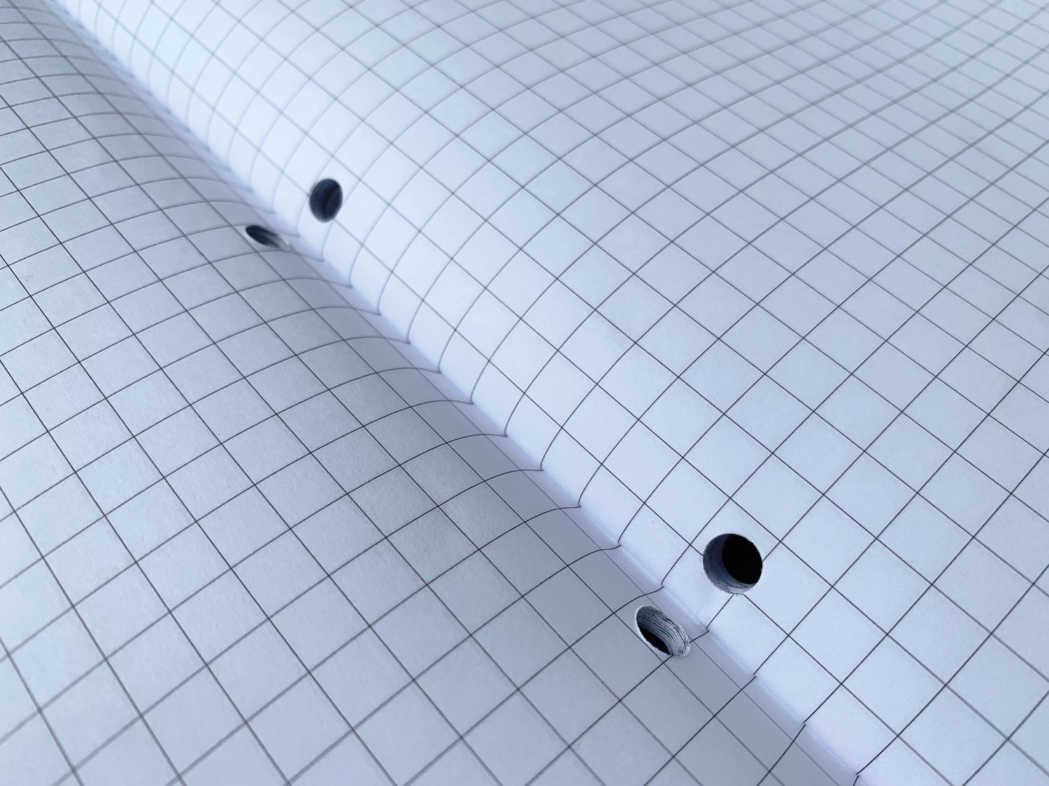 maths ruling - hole punched school exercise books